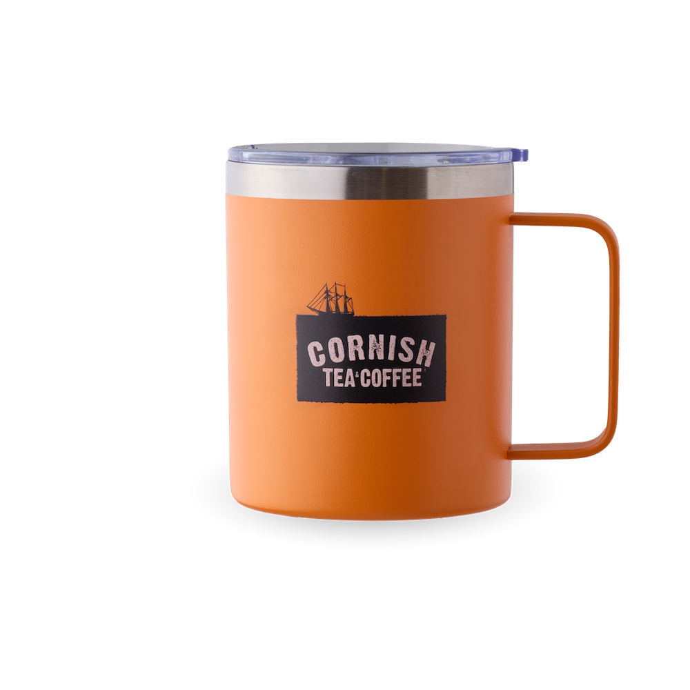 Orange metal travel mug with secure sip lid and handle from Cornish Tea & Coffee.