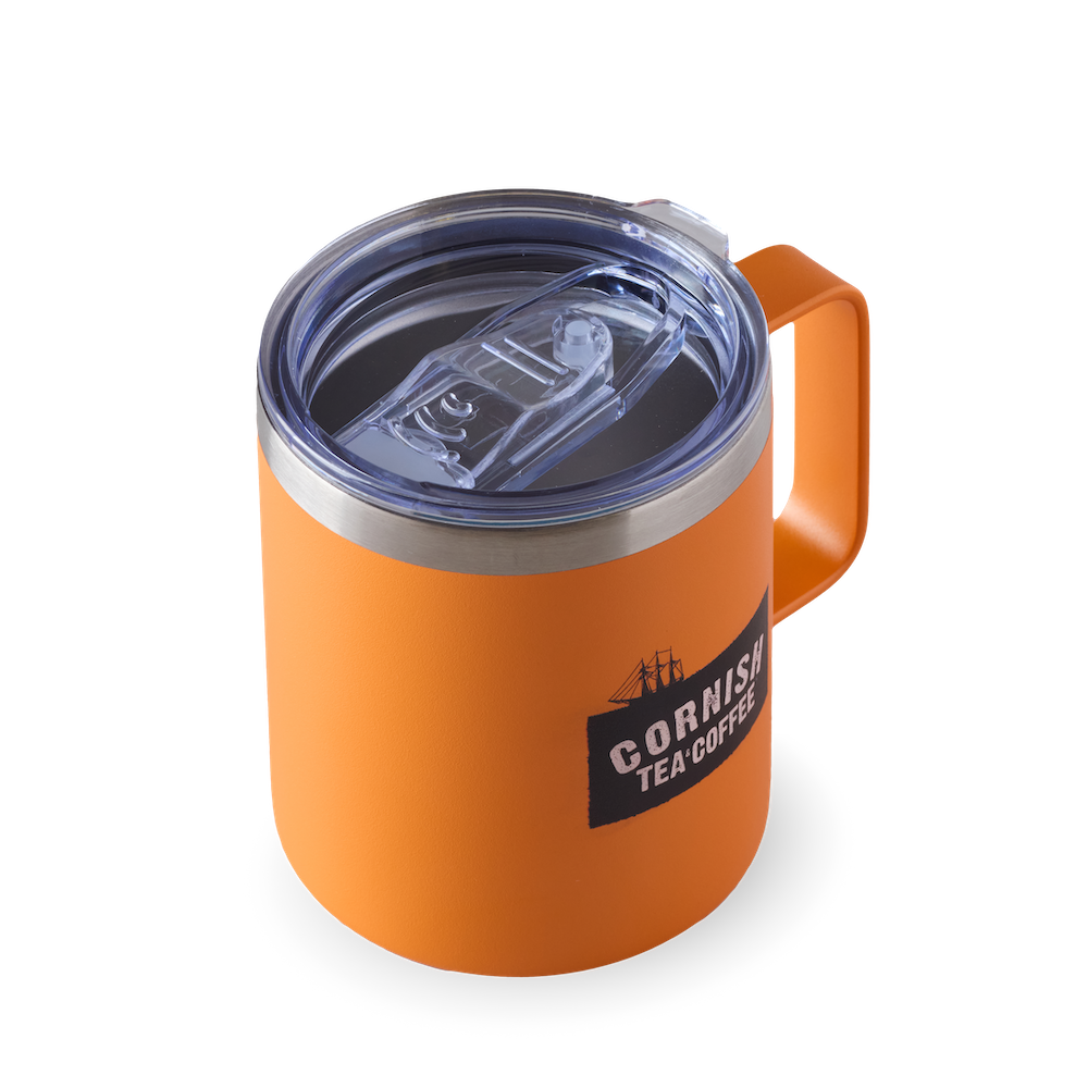 Orange metal travel mug with secure sip lid and handle from Cornish Tea & Coffee.